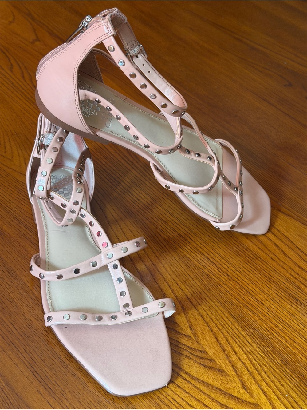 Vince Camuto, new without box,a light pink that looks more like cream color.